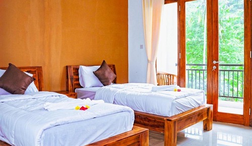 Chambre Deluxe avec lits jumeaux, plusieurs lits
