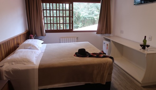 Chambre Deluxe, 1 lit double et 1 canapé-lit