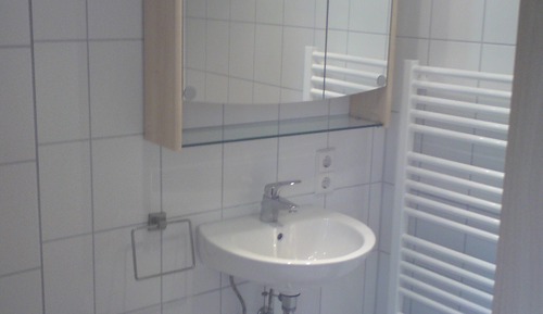 Chambre Double, salle de bains commune, vue ville
