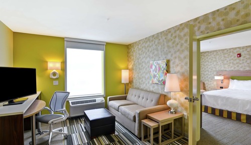 Suite, 1 grand lit, accessible aux personnes à mobilité réduite, baignoire