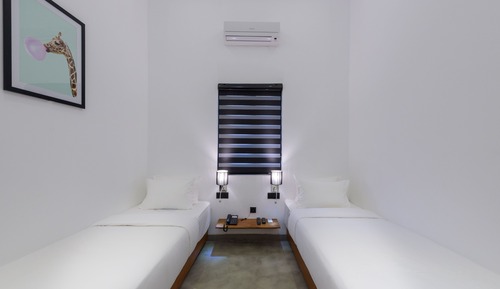 Chambre Confort avec lits jumeaux, accessible aux personnes à mobilité réduite