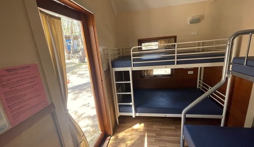 Chambre, plusieurs lits