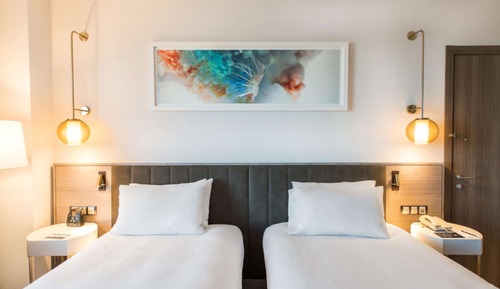 Chambre avec lits jumeaux, vue mer