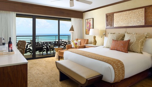 Chambre, 1 très grand lit, en front de mer
