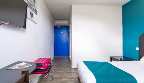 Chambre avec lits jumeaux climatisée