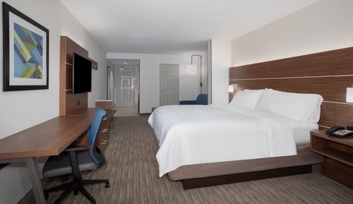 Suite, 1 très grand lit et 1 canapé-lit, accessible aux personnes à mobilité réduite (Communication)
