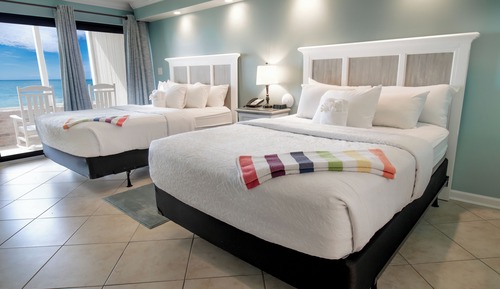 Chambre Double Luxe, 2 grands lits, vue océan, en front de mer