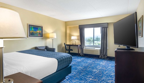 Chambre Standard, 1 très grand lit, accessible aux personnes à mobilité réduite, baignoire