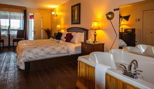 Suite Signature, 1 très grand lit, foyer, bain tourbillon