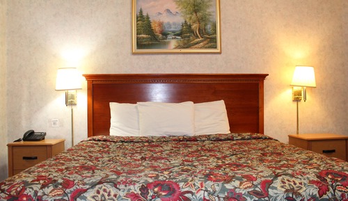 Chambre Deluxe, 1 très grand lit, fumeurs, réfrigérateur et four à micro-ondes