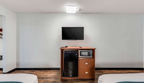 Chambre Deluxe, 2 grands lits, fumeurs, réfrigérateur et four à micro-ondes