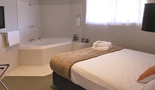 Chambre Premium, baignoire à jets