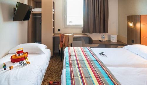 Chambre Triple, 1 grand lit et 1 lit supplémentaire