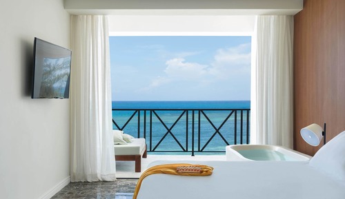 FREE UPGRADE TO EXCELLENCE CLUB JUNIOR SUITE PARTIAL OCEAN VIEW