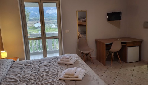 Chambre Quadruple Deluxe, salle de bains attenante