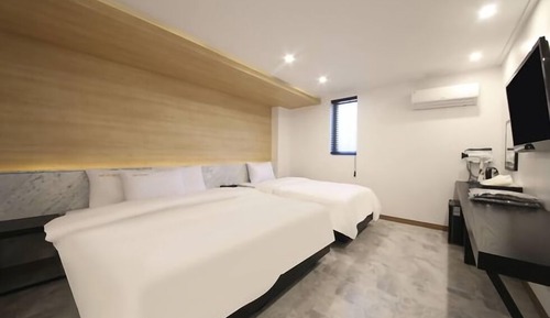 Chambre Affaires avec lits jumeaux, plusieurs lits