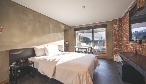 Chambre Double Deluxe, 1 lit double, terrasse, en front de plage
