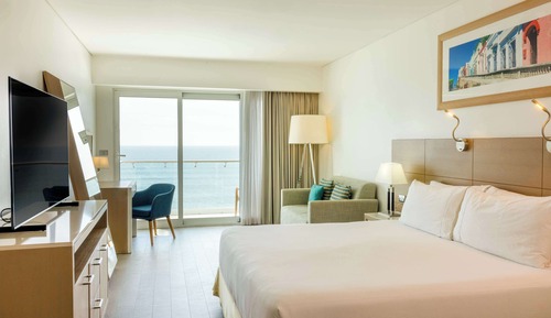 Junior, Suite, 1 grand lit, balcon, en front de mer