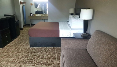 Chambre, 1 très grand lit, fumeurs