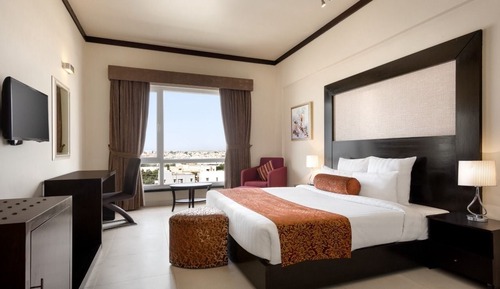 Chambre Deluxe, 1 très grand lit, fumeurs