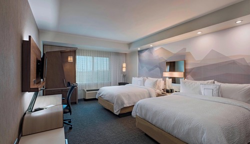 Chambre, plusieurs lits