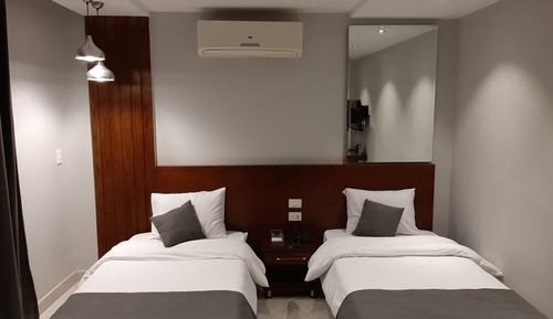 Chambre Confort avec lits jumeaux, 2 lits une place, coin cuisine