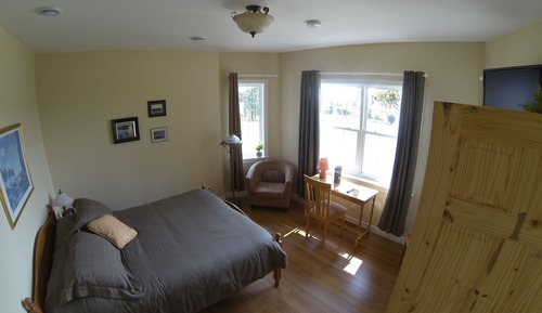 Chambre Premium, 1 grand lit, réfrigérateur et four à micro-ondes, vue partielle sur la mer