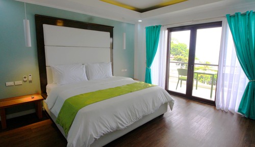 Suite Junior, 1 très grand lit, vue mer