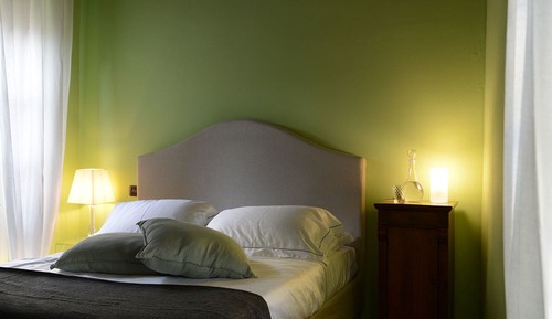 Chambre Deluxe, 1 grand lit, balcon, en angle