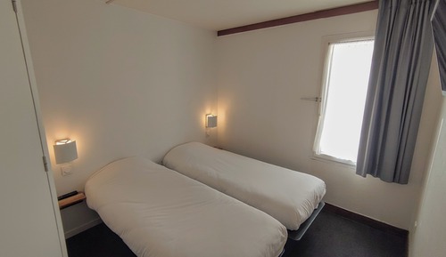 Chambre avec lits jumeaux