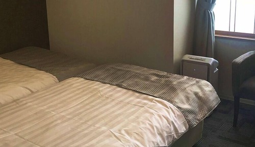 Chambre avec lits jumeaux