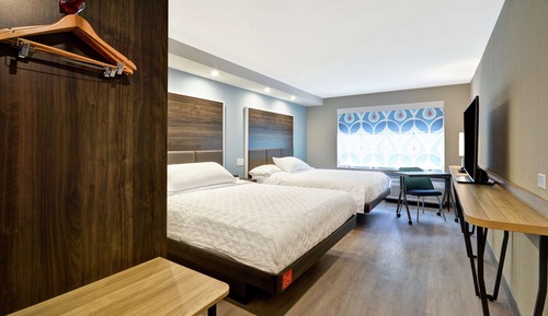 Chambre, 2 grands lits, accessible aux personnes à mobilité réduite, baignoire (Hearing)