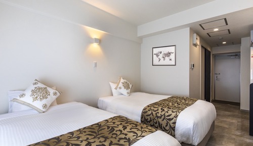 Appartement, dans les dépendances (Nica's Makishi station 1, Twin Room)