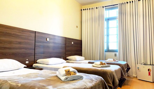 Chambre Triple Deluxe, 2 chambres, salle de bains privée