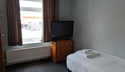 Chambre Simple, salle de bains commune