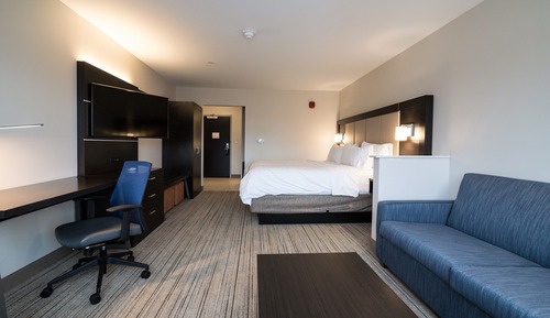 Suite, 2 grands lits, baignoire accessible aux personnes à mobilité réduite (Communications)