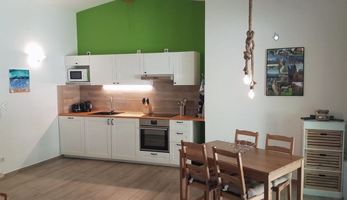 Appartement Duplex Exclusif, 2 chambres, terrasse, vue jardin