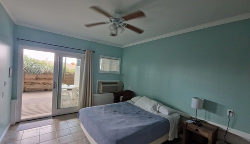 Chambre, 1 grand lit, en bord de plage