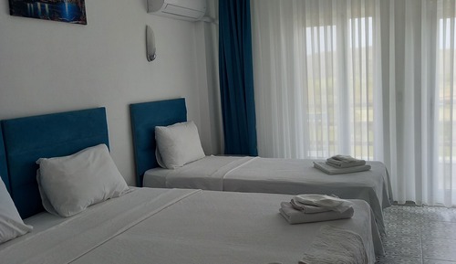 Chambre Triple Luxe, véranda, vue mer