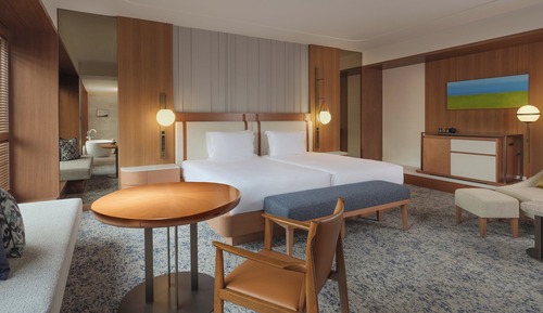 Suite Junior, 2 lits une place, accès au salon club