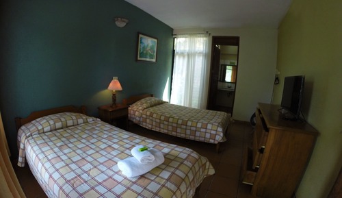 Chambre Triple, 3 lits une place