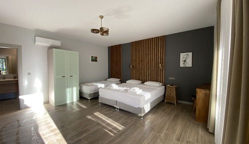 Chambre Triple Deluxe, balcon, vue jardin