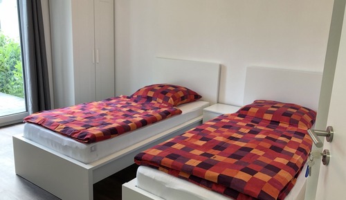 Chambre Économique avec lits jumeaux, salle de bains commune