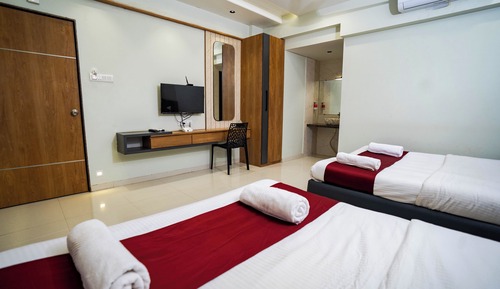 Chambre Quadruple Deluxe