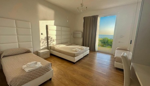 Chambre Quadruple Romantique, vue mer