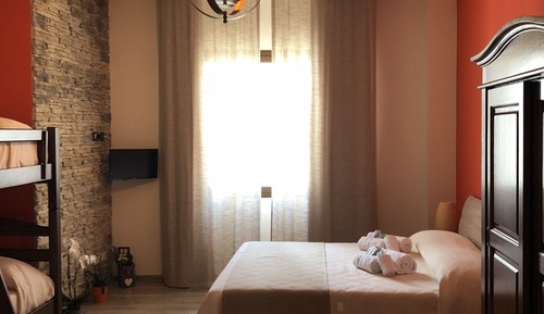 Chambre Quadruple Deluxe
