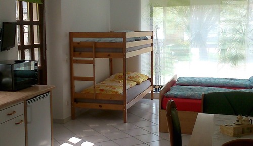 Chambre Quadruple Familiale, plusieurs lits, non-fumeurs, vue jardin