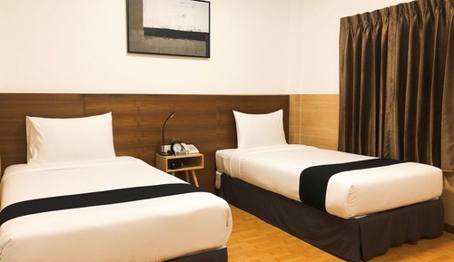 Chambre Supérieure avec lits jumeaux