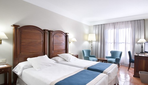 Chambre Standard avec lits jumeaux (2 Adults and 1 Child)