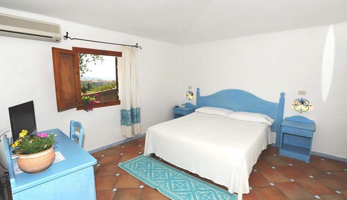 Habitación triple, vistas al mar